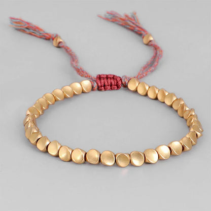 Handmade Tibetan Blessed Knots for "Transformation & Growth" (Made with Natural Copper Beads)