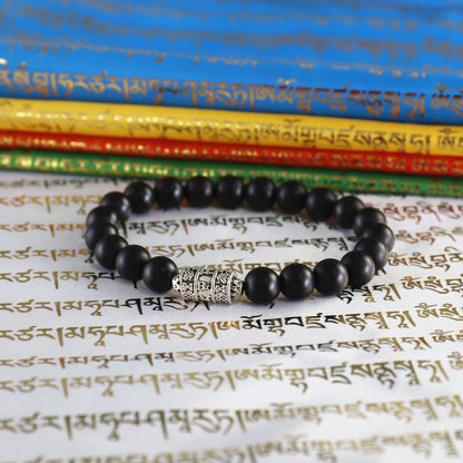Buddhist Handcrafted Nature Sandalwood Bracelet for "Protection & Courage" - with Prayer Wheel & Healing Black Bead Onyx