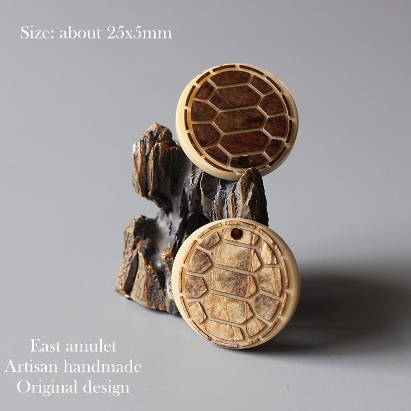Artisan Carved Harmony Pendant (Tagua Nut)