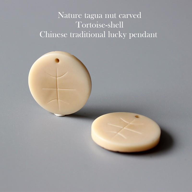 Artisan Carved Harmony Pendant (Tagua Nut)