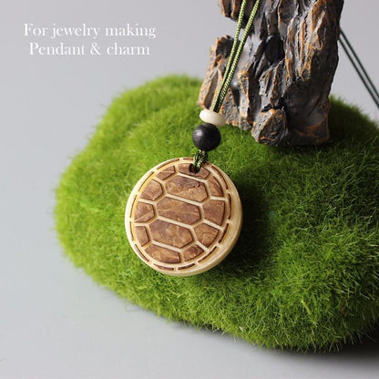Artisan Carved Harmony Pendant (Tagua Nut)