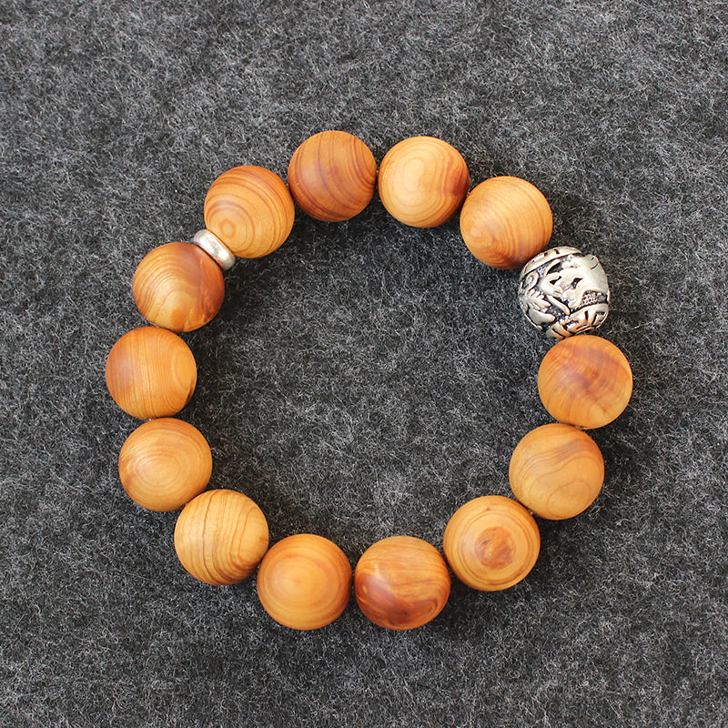 Buddhist Handcrafted Nature Sandalwood Bracelet for "Power & Adventure" (with Traditional Dragon Amulet)