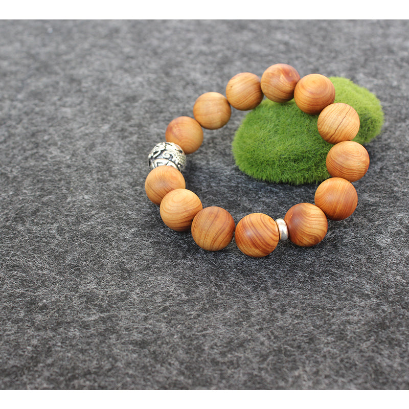 Buddhist Handcrafted Nature Sandalwood Bracelet for "Power & Adventure" (with Traditional Dragon Amulet)