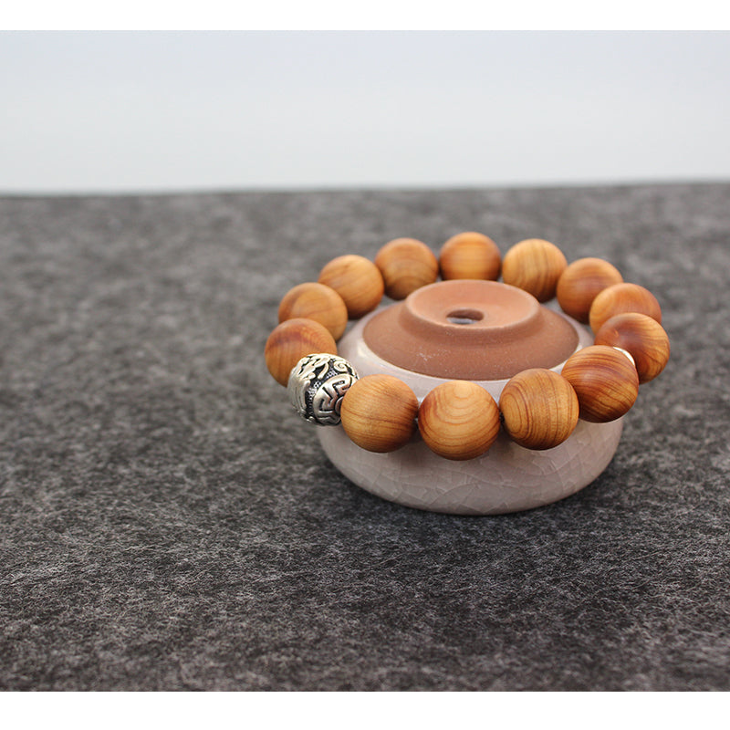 Buddhist Handcrafted Nature Sandalwood Bracelet for "Power & Adventure" (with Traditional Dragon Amulet)