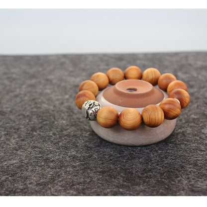 Buddhist Handcrafted Nature Sandalwood Bracelet for "Power & Adventure" (with Traditional Dragon Amulet)