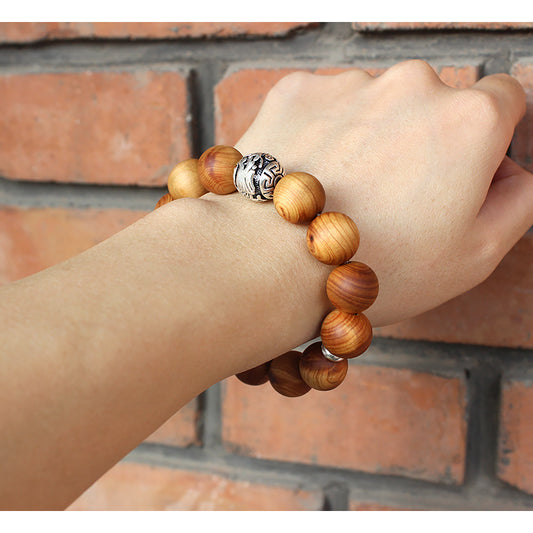 Buddhist Handcrafted Nature Sandalwood Bracelet for "Power & Adventure" (with Traditional Dragon Amulet)