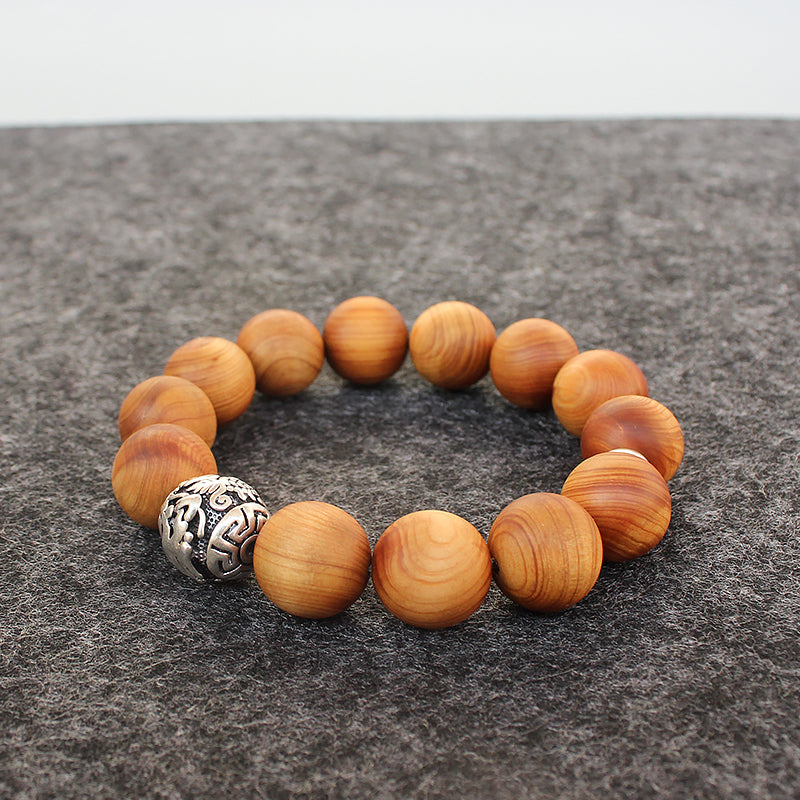 Buddhist Handcrafted Nature Sandalwood Bracelet for "Power & Adventure" (with Traditional Dragon Amulet)