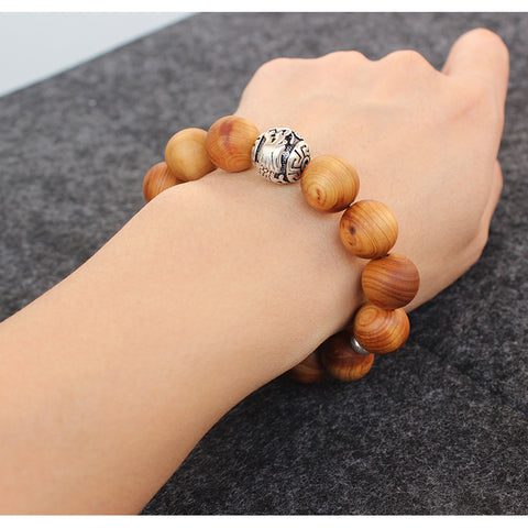 Buddhist Handcrafted Nature Sandalwood Bracelet for "Power & Adventure" (with Traditional Dragon Amulet)