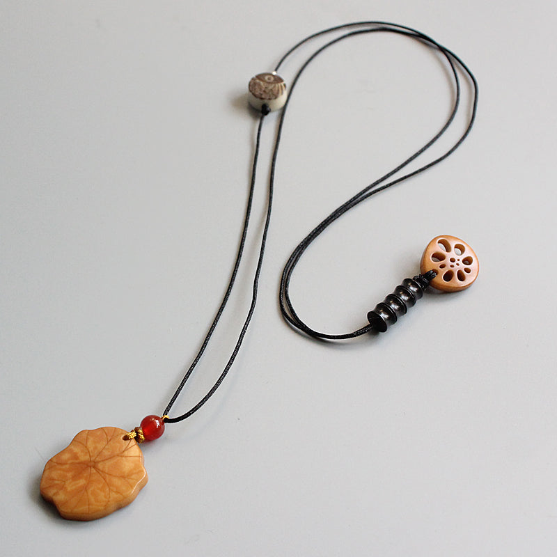 Protective Lotus Pendant (Tagua Nut)