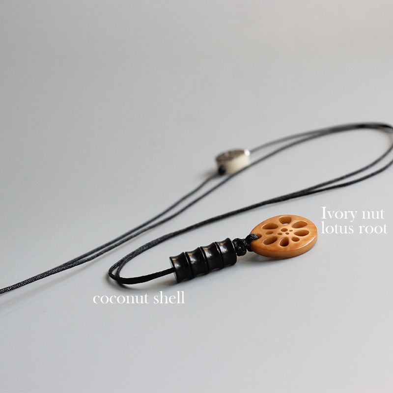 Protective Lotus Pendant (Tagua Nut)