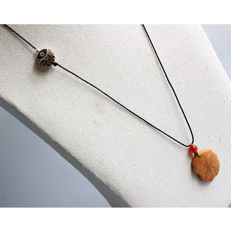 Protective Lotus Pendant (Tagua Nut)