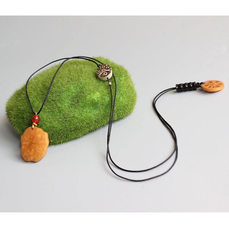 Protective Lotus Pendant (Tagua Nut)