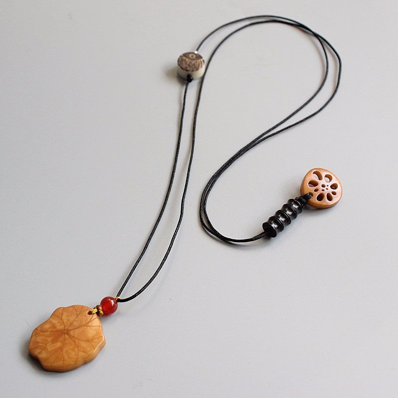 Protective Lotus Pendant (Tagua Nut)