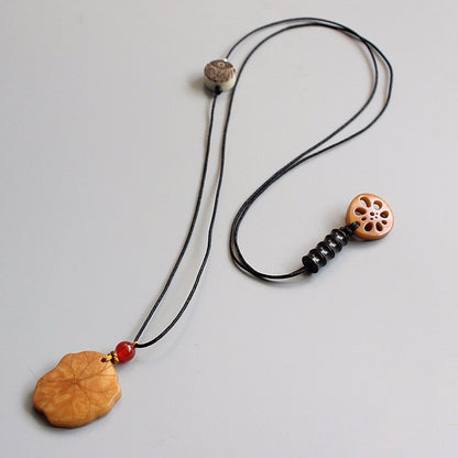 Protective Lotus Pendant (Tagua Nut)