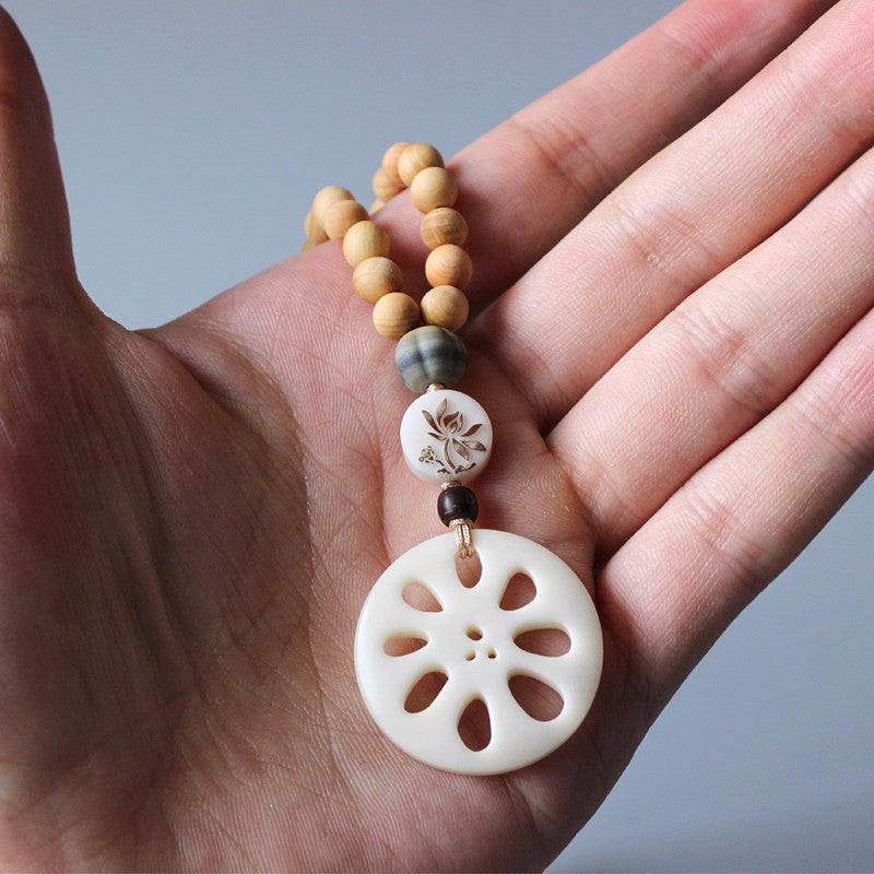 Buddhist Handcrafted Nature Sandalwood Abundance Pendant (Tagua Nut)