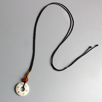 Strength and Transformation Necklace (Tagua Nut)
