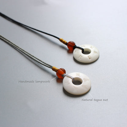 Strength and Transformation Necklace (Tagua Nut)