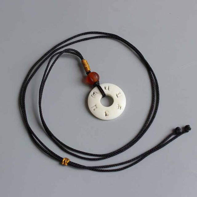 Strength and Transformation Necklace (Tagua Nut)