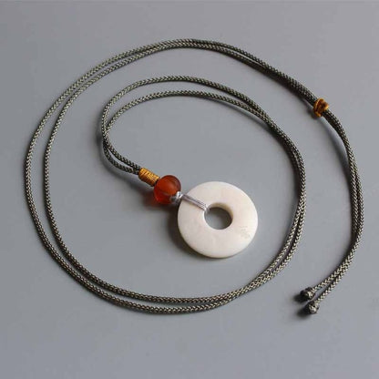 Strength and Transformation Necklace (Tagua Nut)